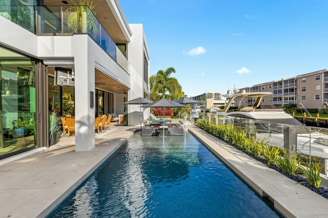 pool featuring a patio