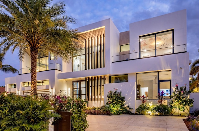 view of front of house featuring stucco siding