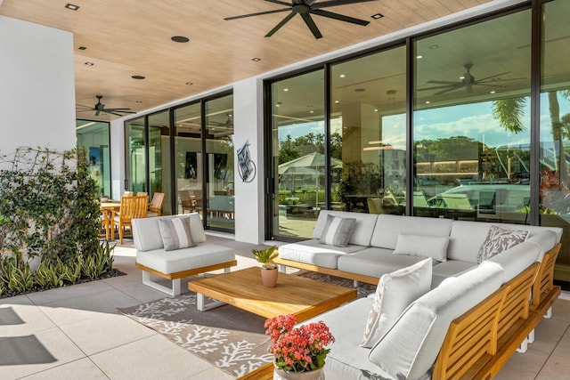 view of patio featuring outdoor lounge area and ceiling fan