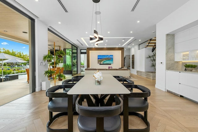 dining area featuring recessed lighting, baseboards, and floor to ceiling windows