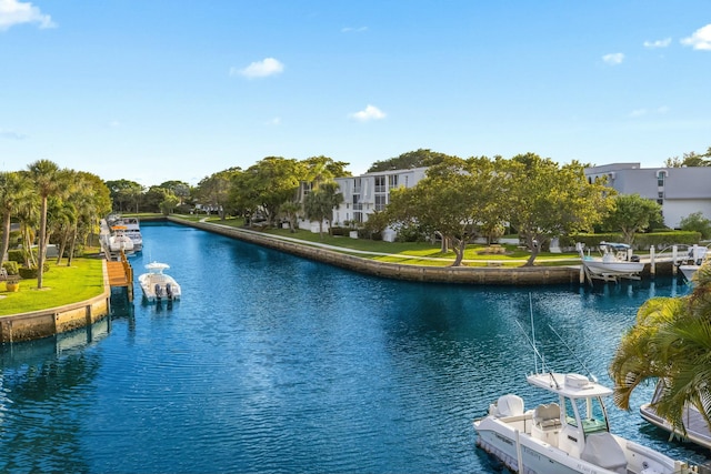 property view of water with a dock