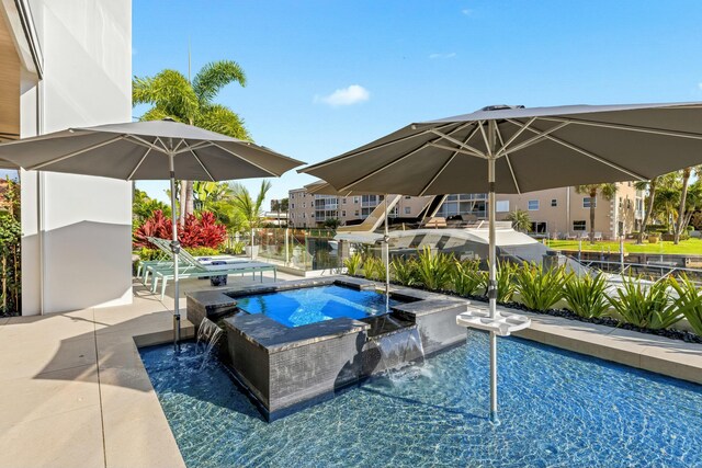 outdoor pool with a patio