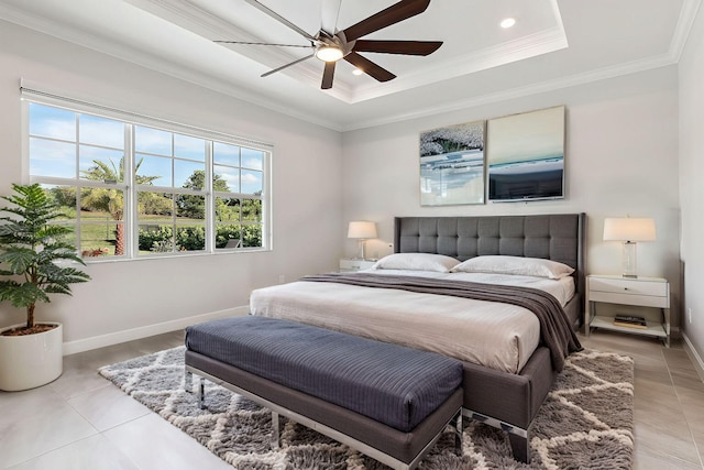 bedroom with a raised ceiling, crown molding, light tile patterned floors, and ceiling fan