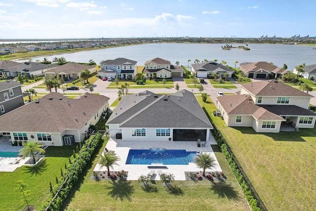 bird's eye view with a water view