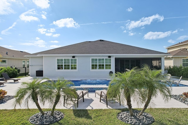 rear view of property with a patio