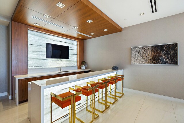 bar featuring wood ceiling