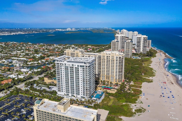 aerial view featuring a water view and a beach view