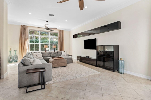 living room featuring crown molding, ceiling fan, and light tile patterned floors