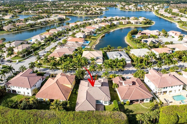 bird's eye view with a water view