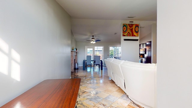 living room with ceiling fan