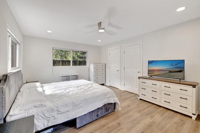 bedroom with a ceiling fan, recessed lighting, and light wood-style floors