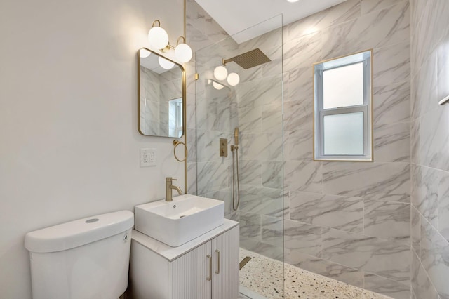 full bathroom featuring vanity, toilet, and walk in shower