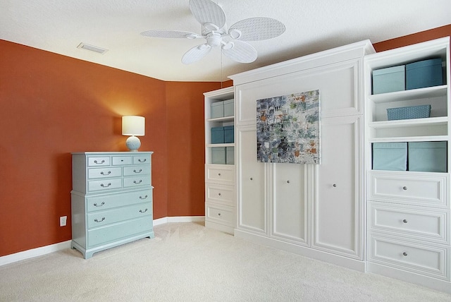 unfurnished bedroom featuring light colored carpet