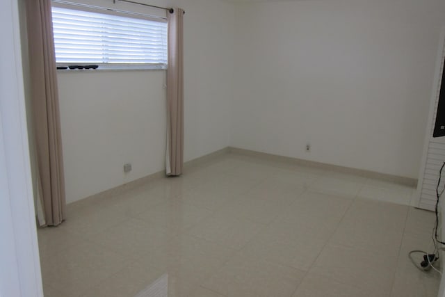 view of tiled empty room