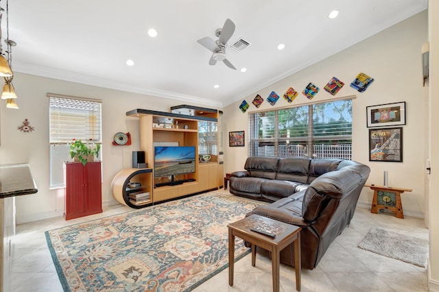 tiled living room featuring lofted ceiling, plenty of natural light, ornamental molding, and ceiling fan