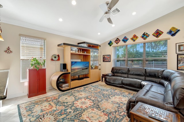 tiled living room with crown molding, a wealth of natural light, and ceiling fan