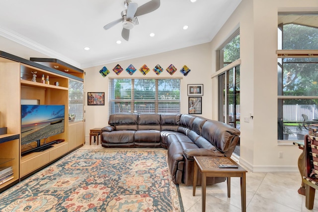 living room featuring light tile patterned floors, ornamental molding, and ceiling fan