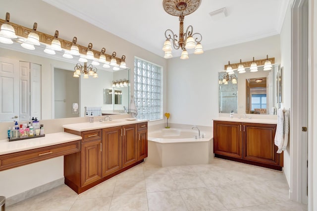 bathroom featuring a bathing tub, tile patterned flooring, ornamental molding, vanity, and a notable chandelier