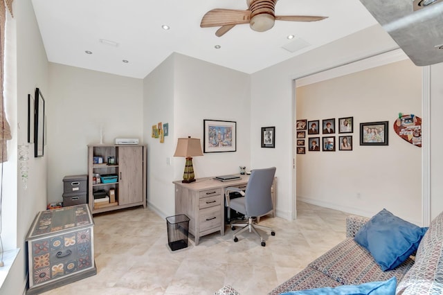 home office featuring light tile patterned floors and ceiling fan