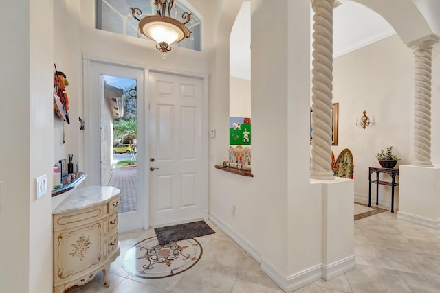 tiled entryway with ornate columns