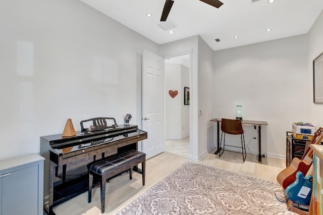 miscellaneous room with ceiling fan and light hardwood / wood-style floors