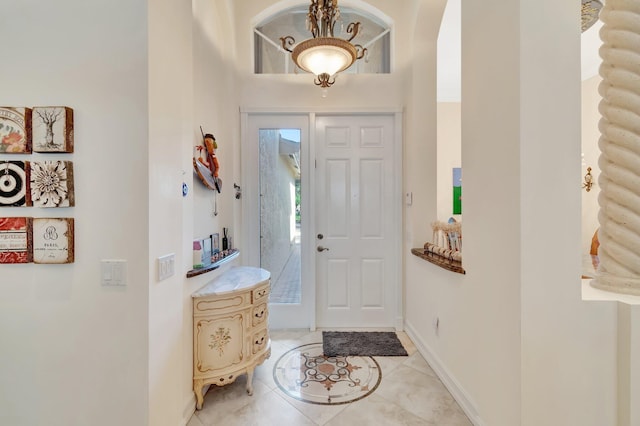 entryway with light tile patterned floors