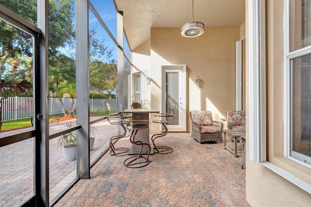 sunroom / solarium featuring plenty of natural light