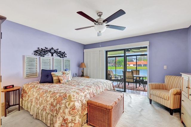 carpeted bedroom with access to outside and ceiling fan