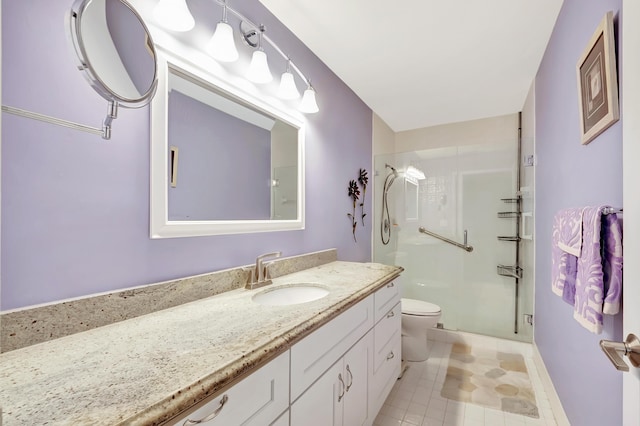 bathroom featuring walk in shower, tile patterned floors, vanity, and toilet