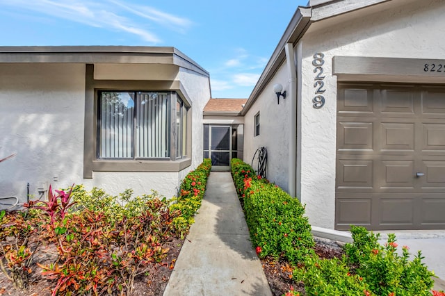 property entrance featuring a garage