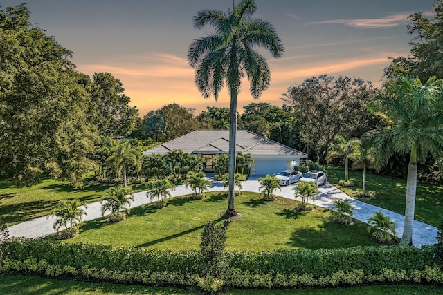 exterior space featuring a water view and a yard