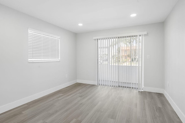 empty room with light wood-type flooring