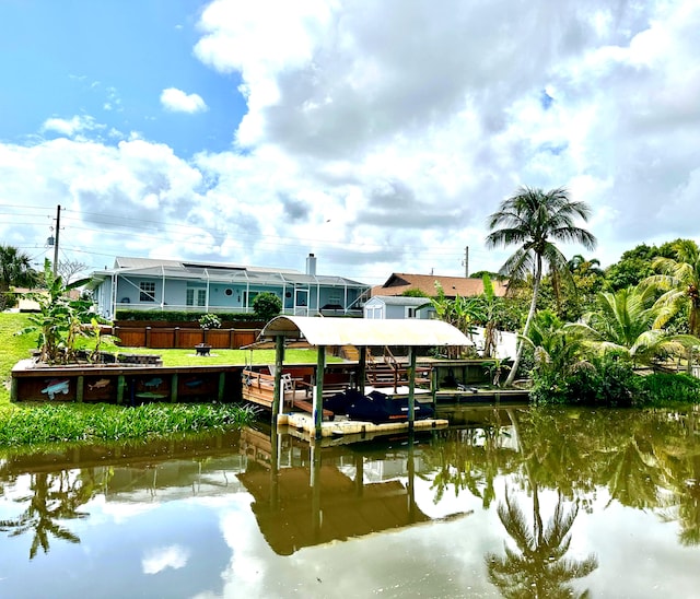 dock with a water view and boat lift