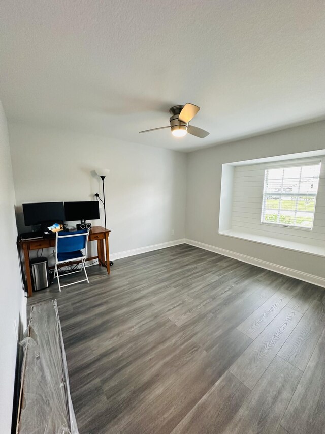 unfurnished bedroom featuring dark hardwood / wood-style flooring and a closet