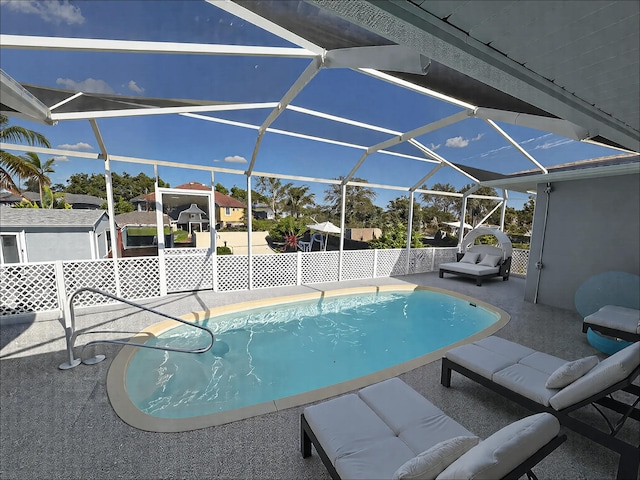 view of pool featuring a patio and a lanai