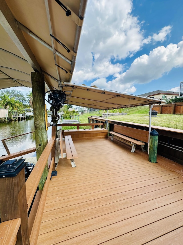 dock area with a water view