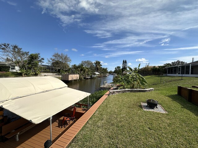 property view of water with a boat dock