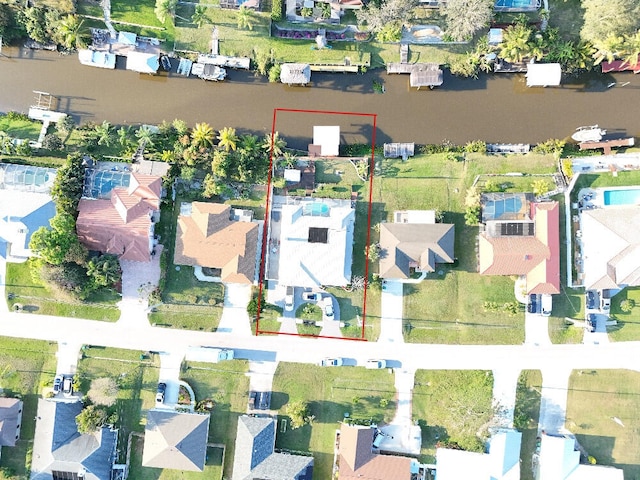 aerial view of residential area featuring property boundaries highlighted