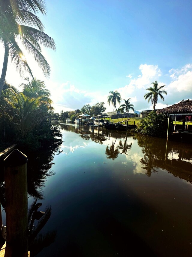 view of dock with a water view