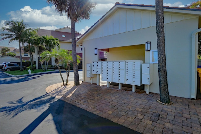 view of property's community featuring mail area