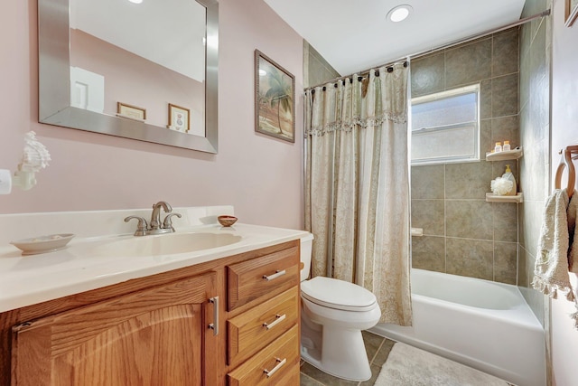 full bathroom with vanity, tile patterned flooring, shower / bath combo, and toilet