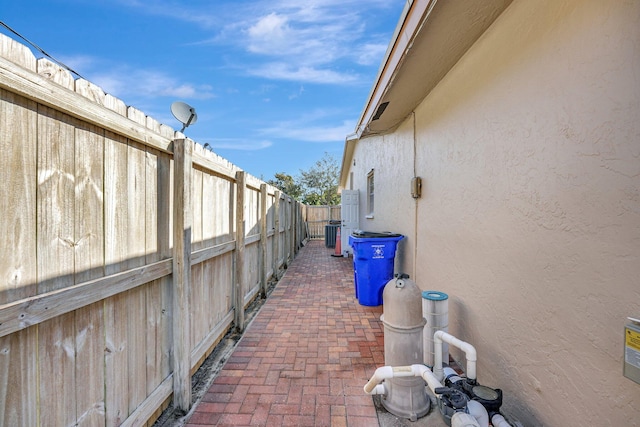 view of patio / terrace featuring fence