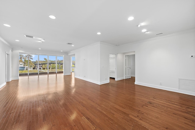 unfurnished living room with hardwood / wood-style floors and ornamental molding