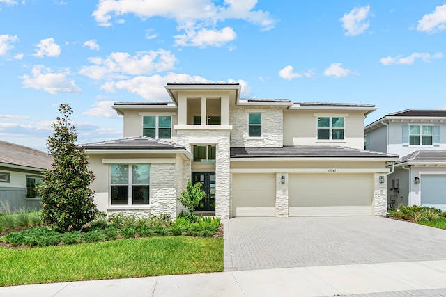 view of front of property featuring a garage