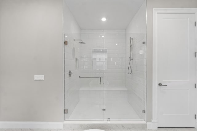 bathroom with an enclosed shower