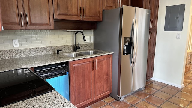 kitchen featuring electric panel, a sink, range with electric stovetop, stainless steel fridge with ice dispenser, and dishwasher