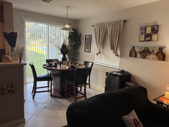 view of tiled dining space