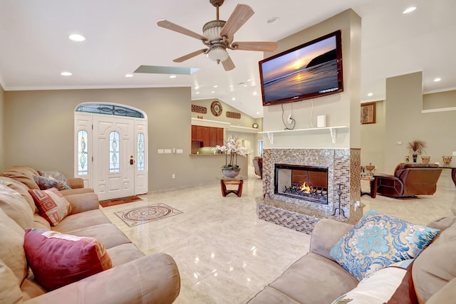 living room with lofted ceiling, crown molding, and a multi sided fireplace