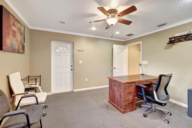 carpeted office featuring ornamental molding and ceiling fan