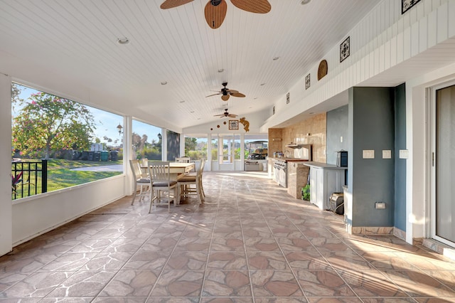 view of patio with ceiling fan and exterior kitchen